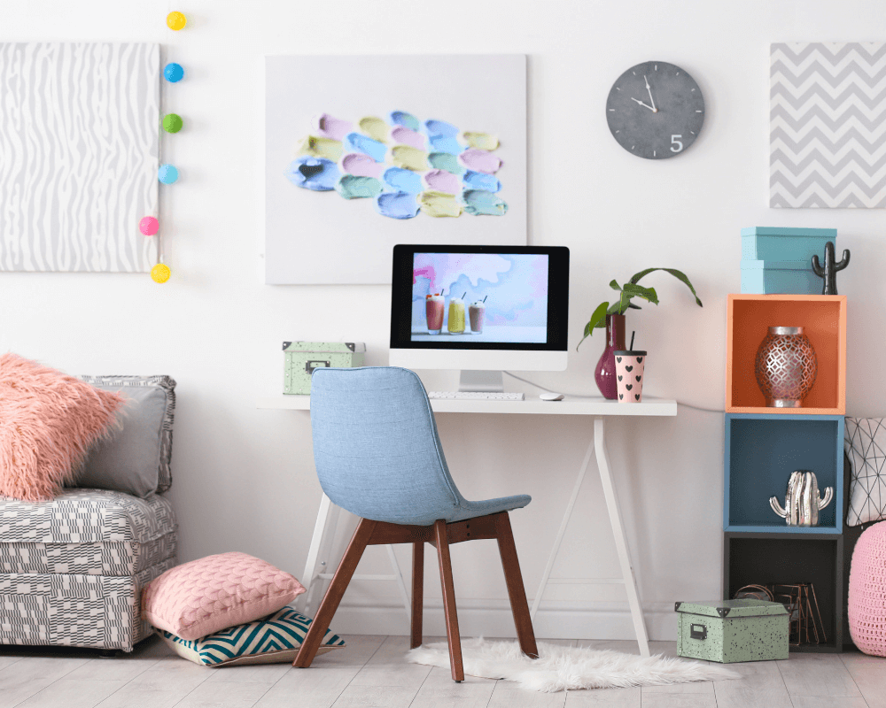 An office that is decorated in pastel shades of pink, blue and green