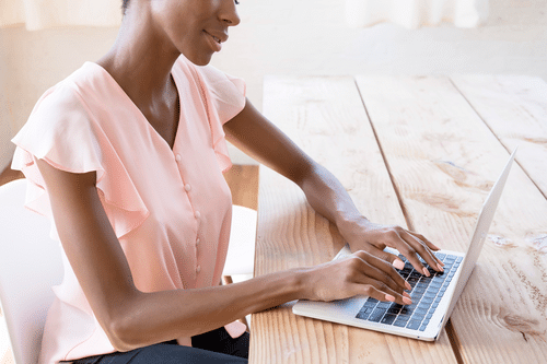 woman behind laptop