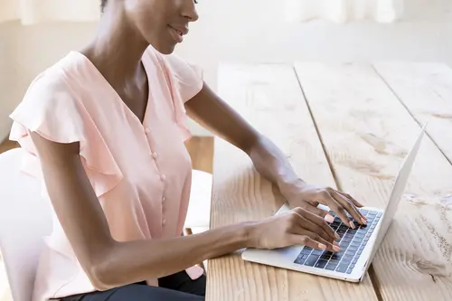 woman behind laptop