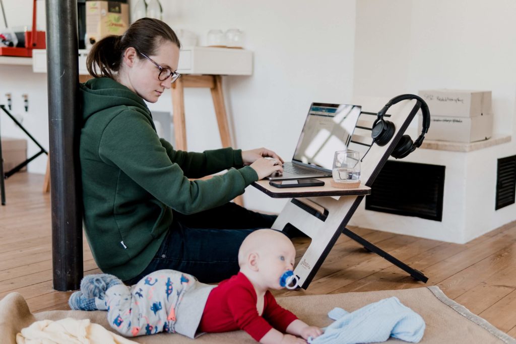 mom working from home with baby