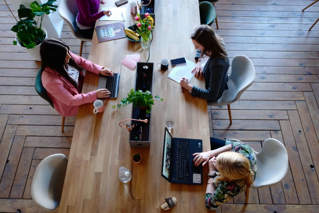women working together in coworking space