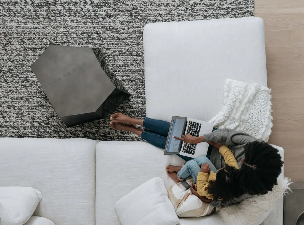 mom working from home with daughter