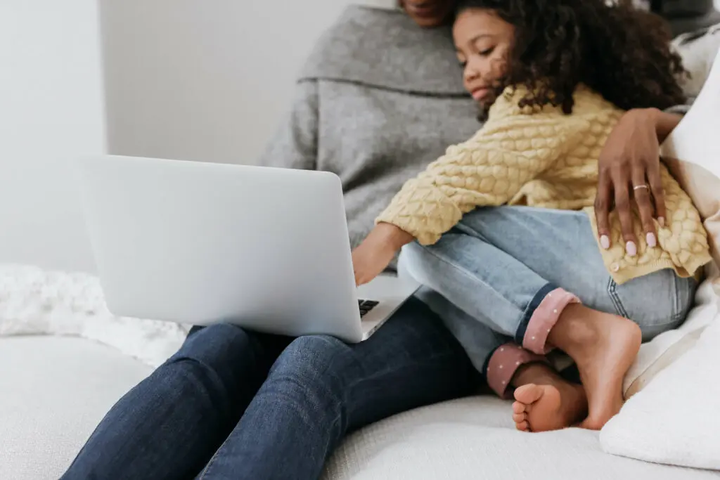 daughter with mom while working
